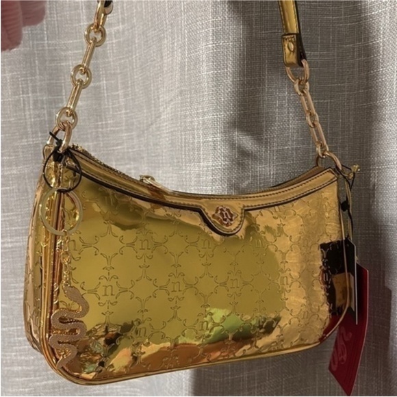 Nanette Lepore gold metallic bag
NEW - Picture 2 of 5